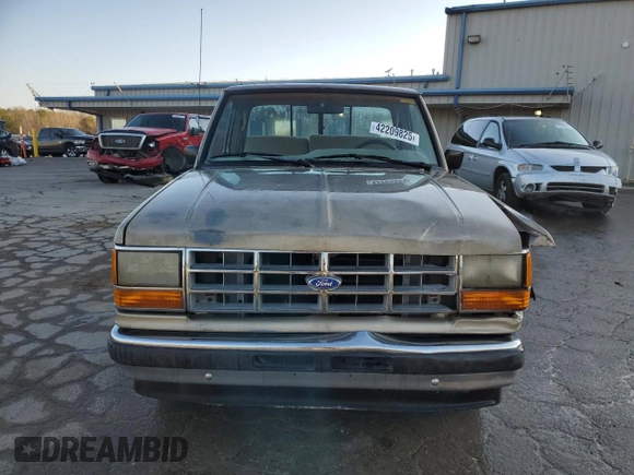 1989 Ford Ranger XL with VIN 1FTCR10AXKUC35082, listed as a Copart auction lot 42209825 with 754,095 mi miles and Salvage title. Bid and sale history available at DreamBid. Image 5.