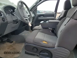 2005 Ford F-150 STX with VIN 1FTRX12W45NB42078, listed as a Copart auction lot 48613525 with 215,237 mi miles and Salvage Title. Bid and sale history available at carsss.com. Image 7.