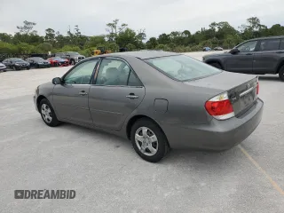 2006 Toyota Camry STD z VIN 4T1BE32K36U699650, wystawiony jako Copart lot #61942095 z przebiegiem 194 810 mil mil oraz Czysty tytuł • Clean title. Historia ofert i sprzedaży dostępna na DreamBid. Obrazek 2.