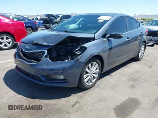 2014 Kia Forte EX with VIN KNAFX4A84E5112910, listed as a IAAI auction lot 42039761 with 118,126 mi miles. Bid and sale history available at carsss.com. Image 2.