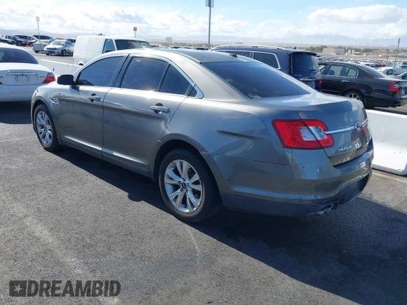 2011 Ford Taurus SEL with VIN 1FAHP2EW9BG158991, listed as a IAAI auction lot 41530132 with 153,323 mi miles. Bid and sale history available at carsss.com. Image 3.