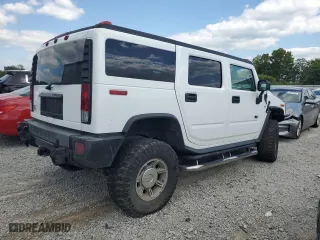 2005 Hummer H2 SUV with VIN 5GRGN23U15H130452, listed as a Copart auction lot 68099154 with 151,369 mi miles and Salvage Title. Bid and sale history available at carsss.com. Image 3.