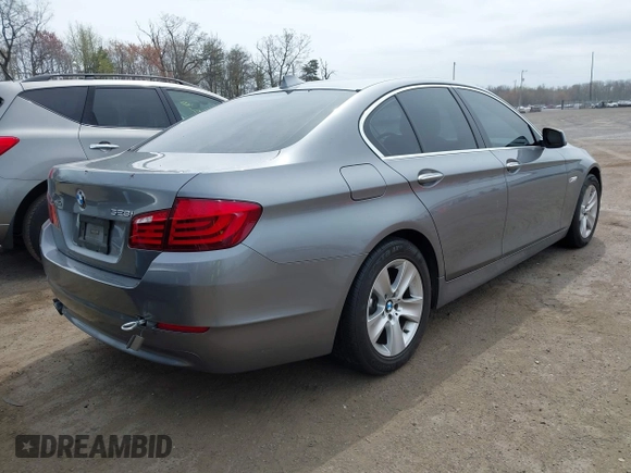 2013 BMW 5 Series 528i xDrive with VIN WBAXH5C55DD111408, listed as a IAAI auction lot 41954630 with 126,704 mi miles. Bid and sale history available at carsss.com. Image 4.