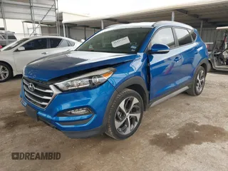 2018 Hyundai Tucson Sport with VIN KM8J33AL0JU803368, listed as a IAAI auction lot 41937235 with 64,163 mi miles and . Bid and sale history available at DreamBid. Image 18.