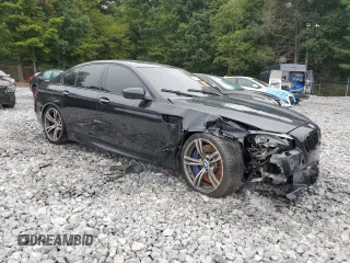 2013 BMW M5 with VIN WBSFV9C53DD096852, listed as a Copart auction lot 65917404 with 0 mi miles and Salvage Title. Bid and sale history available at carsss.com. Image 4.