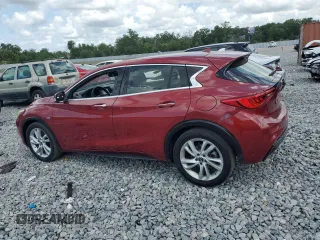 2017 Infiniti QX30 Premium with VIN SJKCH5CP1HA039923, listed as a Copart auction lot 52682745 with 132,947 mi miles and Clean Title. Bid and sale history available at DreamBid. Image 2.