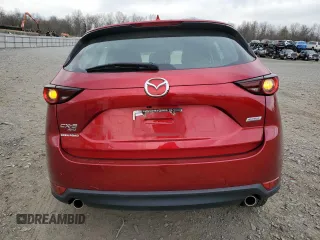 2019 Mazda CX-5 Sport with VIN JM3KFBBM5K0525696, listed as a Copart auction lot 49621595 with 87,536 mi miles and Salvage Title. Bid and sale history available at DreamBid. Image 6.