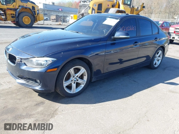 2013 BMW 3 Series 328i xDrive with VIN WBA3B3G54DNR80235, listed as a IAAI auction lot 42105883 with 144,023 mi miles. Bid and sale history available at carsss.com. Image 2.