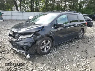 2018 Honda Odyssey Touring с VIN 5FNRL6H87JB028862, выставлен на аукционе Copart как лот 58856765 с пробегом 108 157 миль миль и Списание • Salvage title. История ставок и продаж доступна на DreamBid. Изображение 1.
