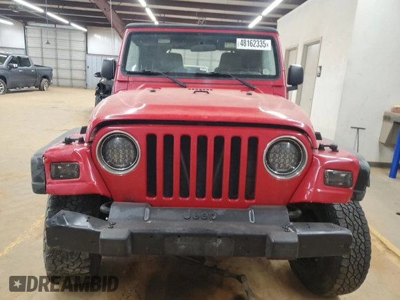 2004 Jeep Wrangler SE с VIN 1J4FA29164P771472, выставлен на аукционе Copart как лот 48162335 с пробегом 175 764 миль миль и Списание • Salvage title. История ставок и продаж доступна на DreamBid. Изображение 5.
