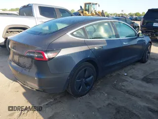 2018 Tesla Model 3 Long Range Battery with VIN 5YJ3E1EB0JF170215, listed as a IAAI auction lot 41969004 with 81,704 mi miles and . Bid and sale history available at DreamBid. Image 4.
