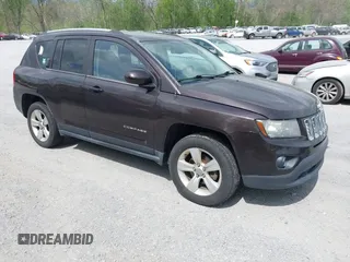 2014 Jeep Compass Latitude with VIN 1C4NJDEBXED622352, listed as a IAAI auction lot 42130403 with 149,024 mi miles. Bid and sale history available at carsss.com. Image 1.