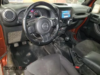 2014 Jeep Wrangler Sport with VIN 1C4AJWAG7EL197285, listed as a Copart auction lot 63451105 with 141,547 mi miles and Salvage title. Bid and sale history available at DreamBid. Image 8.
