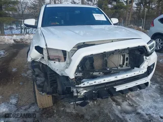 2023 Toyota Tacoma 4WD SR with VIN 3TMCZ5ANXPM599135, listed as a IAAI auction lot 41442577 with 26,901 mi miles. Bid and sale history available at carsss.com. Image 6.