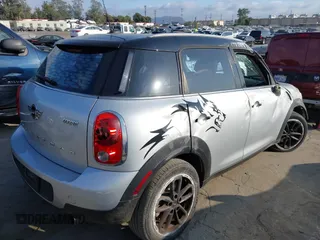 2015 MINI Countryman with VIN WMWZB3C56FWR43359, listed as a IAAI auction lot 40720320 with 69,898 mi miles and . Bid and sale history available at DreamBid. Image 4.