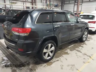 2014 Jeep Grand Cherokee Overland with VIN 1C4RJFCT9EC234270, listed as a IAAI auction lot 41938621 with 144,541 mi miles and . Bid and sale history available at DreamBid. Image 4.