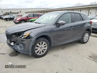 2015 Mazda CX-5 Sport z VIN JM3KE2BEXF0469983, wystawiony jako Copart lot #80961884 z przebiegiem 133 644 mil mil oraz Szkoda całkowita • Salvage title. Historia ofert i sprzedaży dostępna na DreamBid. Obrazek 1.