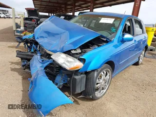 2005 Kia Spectra with VIN KNAFE161655095608, listed as a IAAI auction lot 41990765 with 51,415 mi miles. Bid and sale history available at carsss.com. Image 17.