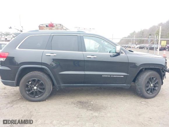 2016 Jeep Grand Cherokee Limited 75th Anniversary with VIN 1C4RJFBG9GC392048, listed as a IAAI auction lot 41897595 with 114,675 mi miles. Bid and sale history available at carsss.com. Image 13.