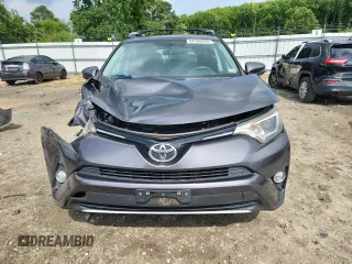 2016 Toyota RAV4 XLE with VIN 2T3RFREV4GW478667, listed as a Copart auction lot 64580095 with 70,593 mi miles and Salvage title. Bid and sale history available at DreamBid. Image 5.