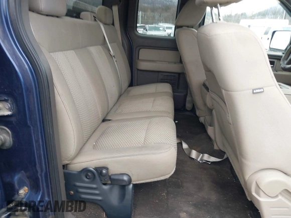 2009 Ford F-150 STX with VIN 1FTRX14809KC93165, listed as a IAAI auction lot 41563841 with 156,690 mi miles. Bid and sale history available at carsss.com. Image 8.