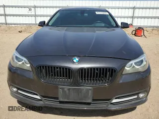 2016 BMW 5 Series 528i with VIN WBA5A5C51GG351554, listed as a Copart auction lot 61210265 with 73,968 mi miles and Salvage title. Bid and sale history available at DreamBid. Image 5.