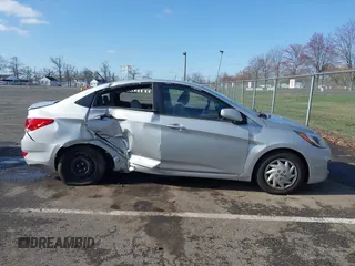2013 Hyundai Accent GLS with VIN KMHCT4AE4DU477465, listed as a IAAI auction lot 41930256 with 48,877 mi miles and . Bid and sale history available at carsss.com. Image 13.