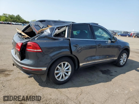 2015 Volkswagen Touareg Lux с VIN WVGEP9BP6FD003059, выставлен на аукционе Copart как лот 59670505 с пробегом 162 945 миль миль и Списание • Salvage title. История ставок и продаж доступна на DreamBid. Изображение 3.
