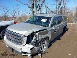 2016 GMC Yukon XL SLE with VIN 1GKS2FKC9GR458451, listed as a IAAI auction lot 41664562 with 196,400 mi miles. Bid and sale history available at carsss.com. Image 6.