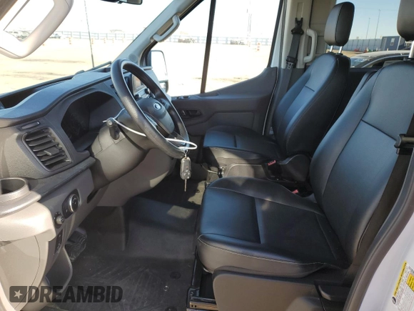 2023 Ford Transit Passenger XL with VIN 1FBAX9C85PKC11039, listed as a Copart auction lot 88472055 with 8,569 mi miles and Salvage Title. Bid and sale history available at DreamBid. Image 7.