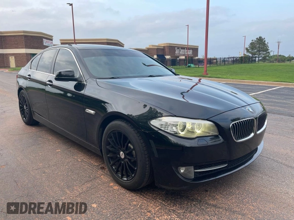 2013 BMW 5 Series 528i with VIN WBAXG5C55DDY31245, listed as a Copart auction lot 54993245 with 118,760 mi miles and Clean Title. Bid and sale history available at carsss.com. Image 1.