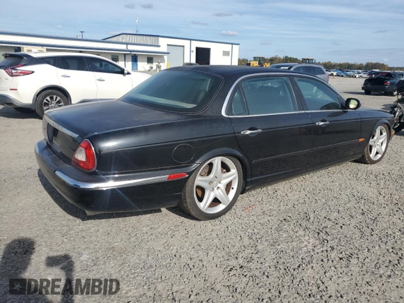 2005 Jaguar XJ Vanden Plas with VIN SAJWA82B05TG47030, listed as a Copart auction lot 41040574 with 114,520 mi miles and Salvage Title. Bid and sale history available at carsss.com. Image 3.
