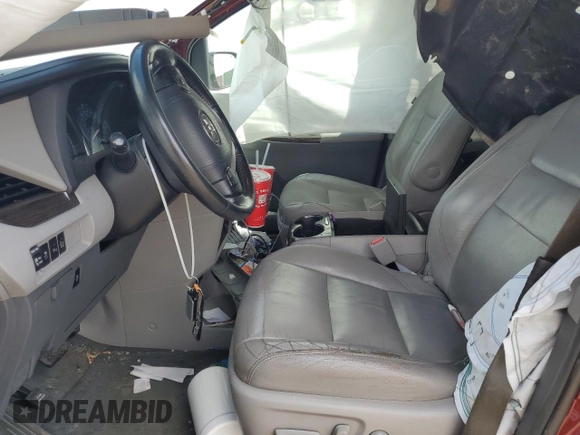2016 Toyota Sienna XLE with VIN 5TDYK3DC5GS730870, listed as a Copart auction lot 62107505 with 131,619 mi miles and Salvage title. Bid and sale history available at DreamBid. Image 7.