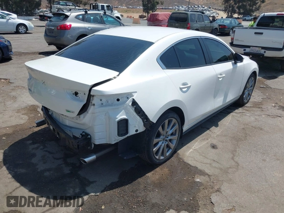 2023 Mazda 3 S Carbon Edition with VIN 3MZBPACM1PM356552, listed as a IAAI auction lot 42603574 with 20,092 mi miles and . Bid and sale history available at DreamBid. Image 4.
