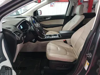 2021 Ford Edge Titanium with VIN 2FMPK4K95MBA50355, listed as a IAAI auction lot 42821253 with 109,191 mi miles and . Bid and sale history available at DreamBid. Image 37.