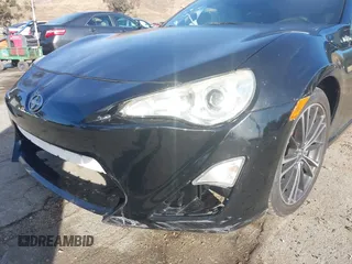 2015 Scion FR-S z VIN JF1ZNAA14F9703780, wystawiony jako IAAI lot #41493648 z przebiegiem 125 997 mil mil oraz . Historia ofert i sprzedaży dostępna na DreamBid. Obrazek 6.