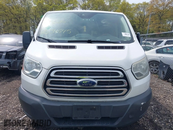 2015 Ford Transit XL with VIN 1FBZX2ZM8FKA20339, listed as a IAAI auction lot 42186096 with Not provided miles and . Bid and sale history available at DreamBid. Image 11.