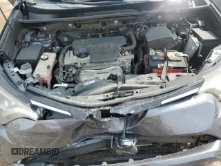 2018 Toyota RAV4 LE z VIN JTMBFREV1JJ219111, wystawiony jako Copart lot #69426224 z przebiegiem 89 555 mil mil oraz Nie do naprawy • Non repairable. Historia ofert i sprzedaży dostępna na DreamBid. Obrazek 14.