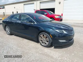 2014 Lincoln MKZ z VIN 3LN6L2GK4ER807516, wystawiony jako IAAI lot #42552625 z przebiegiem 149 386 mil mil oraz . Historia ofert i sprzedaży dostępna na DreamBid. Obrazek 1.