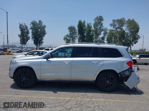 2014 Mercedes-Benz GL 450 z VIN 4JGDF7CE9EA411572, wystawiony jako IAAI lot #42461631 z przebiegiem 121 885 mil mil oraz . Historia ofert i sprzedaży dostępna na DreamBid. Obrazek 14.