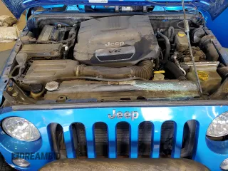 2015 Jeep Wrangler Freedom Edition z VIN 1C4AJWAG7FL520090, wystawiony jako Copart lot #62756975 z przebiegiem Nie podano mil oraz Szkoda całkowita • Salvage title. Historia ofert i sprzedaży dostępna na DreamBid. Obrazek 11.