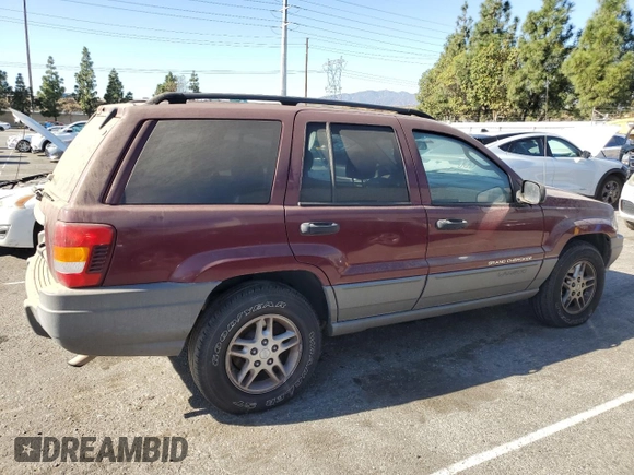 2002 Jeep Grand Cherokee Laredo with VIN 1J4GX48S52C265385, listed as a Copart auction lot 88823385 with 225,106 mi miles and Clean title. Bid and sale history available at DreamBid. Image 3.