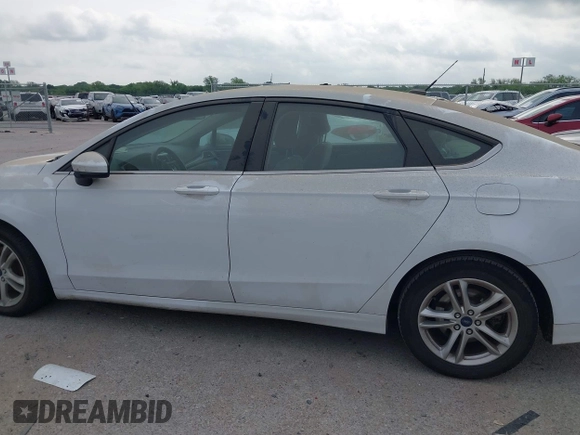 2018 Ford Fusion SE with VIN 3FA6P0H79JR198057, listed as a IAAI auction lot 41815410 with 174,746 mi miles and . Bid and sale history available at DreamBid. Image 14.