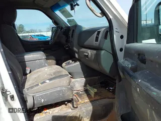 2012 Nissan NV S with VIN 1N6BF0KM8CN110516, listed as a IAAI auction lot 41576965 with 416,401 mi miles. Bid and sale history available at carsss.com. Image 5.