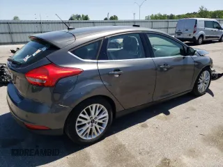 2016 Ford Focus Titanium with VIN 1FADP3N27GL201482, listed as a Copart auction lot 51768335 with 54,463 mi miles and Salvage title. Bid and sale history available at DreamBid. Image 3.