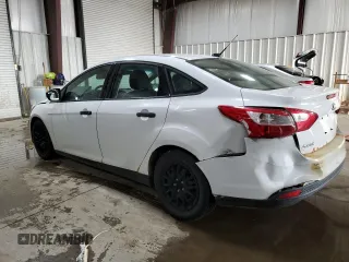 2012 Ford Focus S with VIN 1FAHP3E21CL410972, listed as a Copart auction lot 51037015 with 220,699 mi miles and Salvage Title. Bid and sale history available at DreamBid. Image 2.