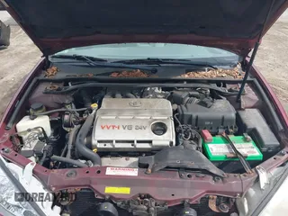 2003 Toyota Camry LE z VIN 4T1BF32K63U050174, wystawiony jako IAAI lot #42260843 z przebiegiem 210 486 mil mil oraz . Historia ofert i sprzedaży dostępna na DreamBid. Obrazek 10.