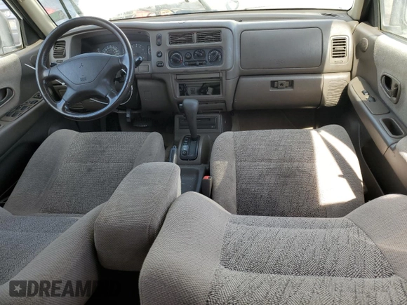 1998 Mitsubishi Montero z VIN JA4LS31P1WP029117, wystawiony jako Copart lot #72069334 z przebiegiem 172 069 mil mil oraz Szkody całkowita. Historia ofert i sprzedaży dostępna na DreamBid. Obrazek 8.