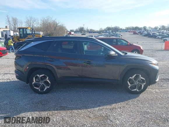 2022 Hyundai Tucson SEL z VIN 5NMJCCAE6NH064395, wystawiony jako IAAI lot #41874438 z przebiegiem 30 798 mil mil oraz . Historia ofert i sprzedaży dostępna na DreamBid. Obrazek 13.
