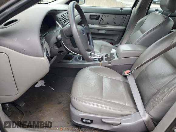 2004 Ford Taurus SES with VIN 1FAFP55U34A113140, listed as a Copart auction lot 53606615 with 99,800 mi miles and Salvage Title. Bid and sale history available at DreamBid. Image 7.
